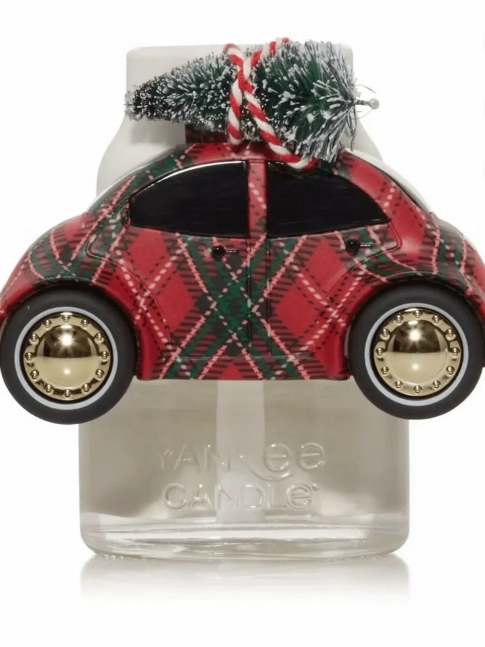 Yankee Candle Plaid Buggy Scent Plug carrying a Christmas Tree